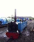 ‘Wroxham Broad’ raises steam outside the engine shed at Aylsham   (30/05/2003)