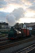 ‘Palmerston’, the Bottom Shunter, was still going strong as the sun sets behind Porthmadog.   (14/10/2005)