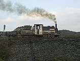 The morning sunlight catches ‘Palmerston’ broadside on Gwyndy Bank.       (15/10/2005)