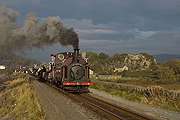 ‘Palmerston’ runs out along the Cob with a rake of slate waggons.       (16/10/2005)