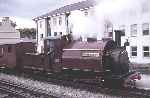 ‘Palmerston’ stands at the head of the Minffordd shuttle, Porthmadog Harbour Station   (01/05/1993)