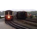 Down train arriving at Porthmadog in push-pull mode, Criccieth Castle at the far end.   (04/05/2003)