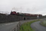 ‘Prince’ runs past the works with short train for Minffordd   (04/05/2003)