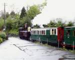 ‘Taliesin’ runs down over Bakehouse Crossing with the vintage train, down end of Penrhyn station   (05/05/2003)