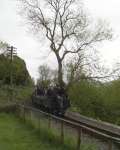 The gravity slate train rolls round the curves onto Penrhyn Crossing   (05/05/2003)