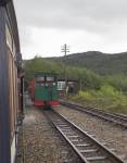Seen from the up vintage train, ‘Moelwyn’ and No 10 Van stand in the loop at Rhiw Goch   (05/05/2003)