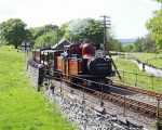 ‘David Lloyd George’ approaches Minffordd with a vintage train, the 14:50 ex-Porthmadog   (05/05/2003)