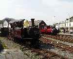 The two ‘Talking Train’ locomotives, ‘Taliesin’ and ‘Prince’ at Harbour station, Porthmadog.   (01/05/2004)