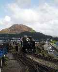 ‘Earl of Merioneth’ takes the token for the run across the Cob to Porthmadog.   (03/05/2004)