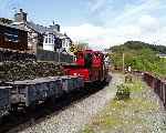 ‘Prince’ leaves Penrhyn with an up train of slate waggons.   (03/05/2004)