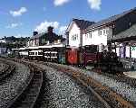 ‘Taliesin’ and the Victorian train stand in the sunshine in Harbour station   (28/09/2003)