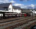 No 18 and the four wheel carriages stand in the sunshine behind Single-Fairlie ‘Taliesin   (28/09/2003)