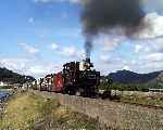 ‘Taliesin’ pulls the Victorian train along the Cob on the way to Tanybwlch   (28/09/2003)
