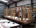The replica (rebuilt?!?) legendary ‘Curly Roofed Van’ slowly takes shape in the carriage shops   (28/09/2003)