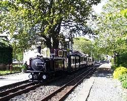 The bright morning sun lights ‘Taliesin’ and the Victorian set at Minffordd.   (03/05/2004)