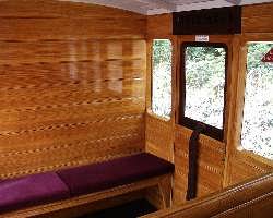 The beautifully restored interior of carriage number 15.   (03/05/2004)