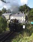 Taliesin with an up vintage train above Penrhyn crossing   (12/10/2002)