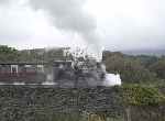 Doing a passable impression of Mount St Helens, ‘Mountaineer’ climbs Gwyndy Bank wreathed in steam.   (25/09/2004)