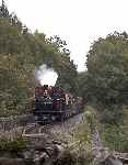 The great embankment, ‘Cei Mawr’ is crossed by ‘David Lloyd George’ with a down train.   (26/09/2004)