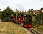 ‘Elf’ climbs the hill from the Appenine Way level crossing as shed heads back to Pages Park.   (07/09/2003)