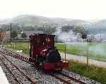 After arriving from Gilfach Ddu, ‘Elidir’ runs round the train at the new Llanberis terminus.   (06/08/2003)