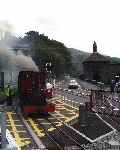 ‘Elidir’ approaches the level crossing at Gilfach Ddu station, arriving off the new extension.   (06/08/2003)