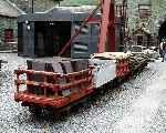 A rake of typical welsh slate quarry wagons, mostly from the Dinorwic quarries.   (06/08/2003)