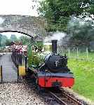 ‘River Irt’ with a down train stands in Irton Road station   (29/06/2000)