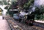 Pacific ‘Hurricane’ backs out of Hythe station to after arriving from the west   (04/08/1982)