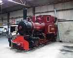 Hiding in the back of the museum building at Strumpshaw was this Jung 0-4-0WT named ‘Ginette Marie’.   (25/05/2003)