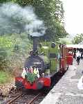 ‘Dolgoch’ stands at the up end of the platform at Abergynolwyn with the ‘Golden Jubilee’ working from Tywyn.   (29/07/2001)
