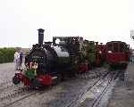 Preparing the evening departure at Tywyn Wharf.  ‘Talyllyn’ has acquired the flags and headboard from No 2.   (29/07/2001)