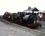 The Talyllyn active fleet in ascending numerical order (and age) wait in the loop at Tywyn Wharf.   (29/07/2001)