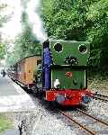 No 1 ‘Talyllyn’ waits to leave Abergynolwyn with a down train, carrying the Golden Jubilee headboard   (01/08/2001)