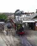 ‘Dolgoch’ with a rake of modern carriages from the road bridge at Tywyn Wharf.   (23/09/2001)