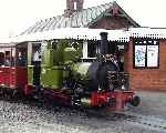 ‘Dolgoch’ standing in the platform at Tywyn Wharf with an up train.   (23/09/2001)