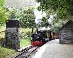 No 7 ‘Tom Rolt’ rolls into Dolgoch station with the morning up train.   (29/09/2003)