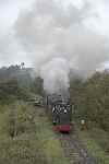 ‘Edward Thomas’ heads towards Ty Mawr bridge with the first train of the day.   (27/09/2004)