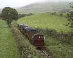 ‘Sir Haydn’ rolls down towards Cynfal Halt with a down train.   (27/09/2004)