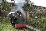 ‘Edward Thomas’ bursts out from under the bridge at Cynfal Halt.   (27/09/2004)