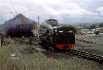 Swindon built 2-6-2T No 7 ‘Owain Glyndwr’ stands outside the shed at Aberystwyth.   (01/09/1990)