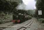 No 7 runs through the disused loop at Aberffrwd with an up train.   (01/09/1990)