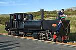 K1 sits in the sun at Rhyd Ddu with the Welsh and Tasmanian flags prominent.       (08/09/2006)