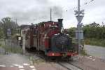 ‘Prince’ crosses the road at Hendy level crossing with a Caernarfon to Dinas shuttle.   (11/09/2004)