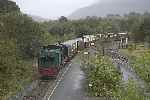 The weather has turned sour as 138 rolls into Waunfawr with the mixed train.   (11/09/2004)