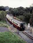 138 puts its shoulder to the grade as the train heads for Dinas   (14/10/1997)