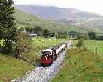 Bowling down the hill from Snowdon Ranger, the Funkey approaches Castell Cidym   (26/09/2003)