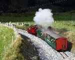 Emerging into the sunlight at Castell Cidym, Prince and the vintage train   (27/09/2003)